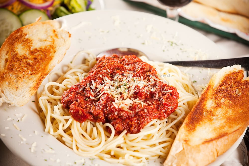 Food and Drink: Closeup Spaghetti Dinner Garlic Bread Salad Food and Drink: Closeup Spaghetti Dinner Garlic Bread Salad