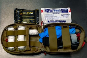 opened trauma kit showing all the neccesary supplies