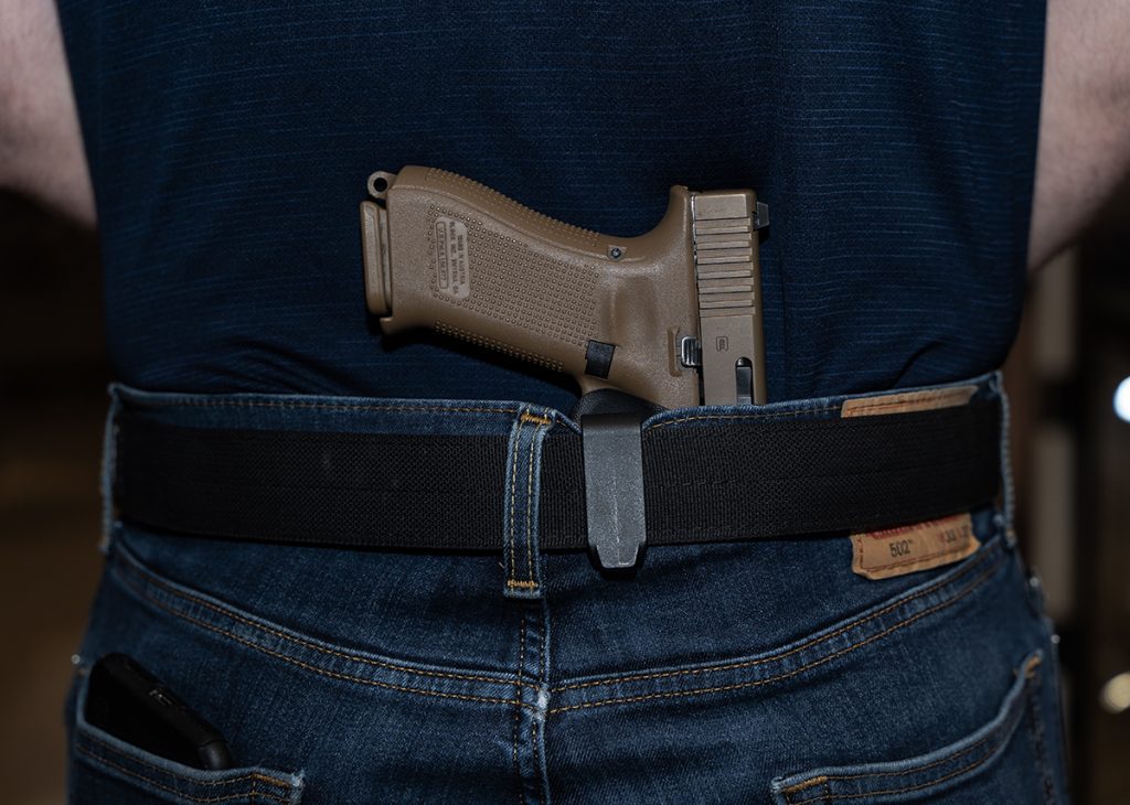 Concealed carry gun in the Small of Back position 