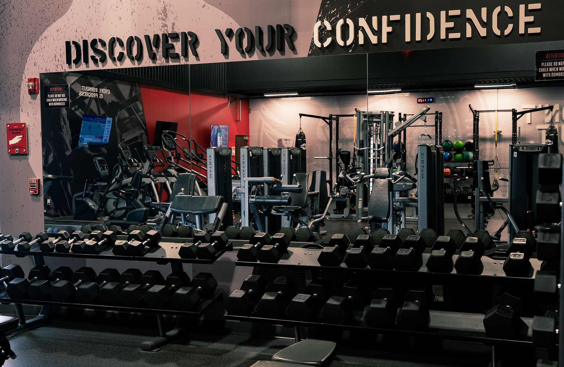 Dumbell rack and mirror at the 88 Tactical 24/7 fitness center