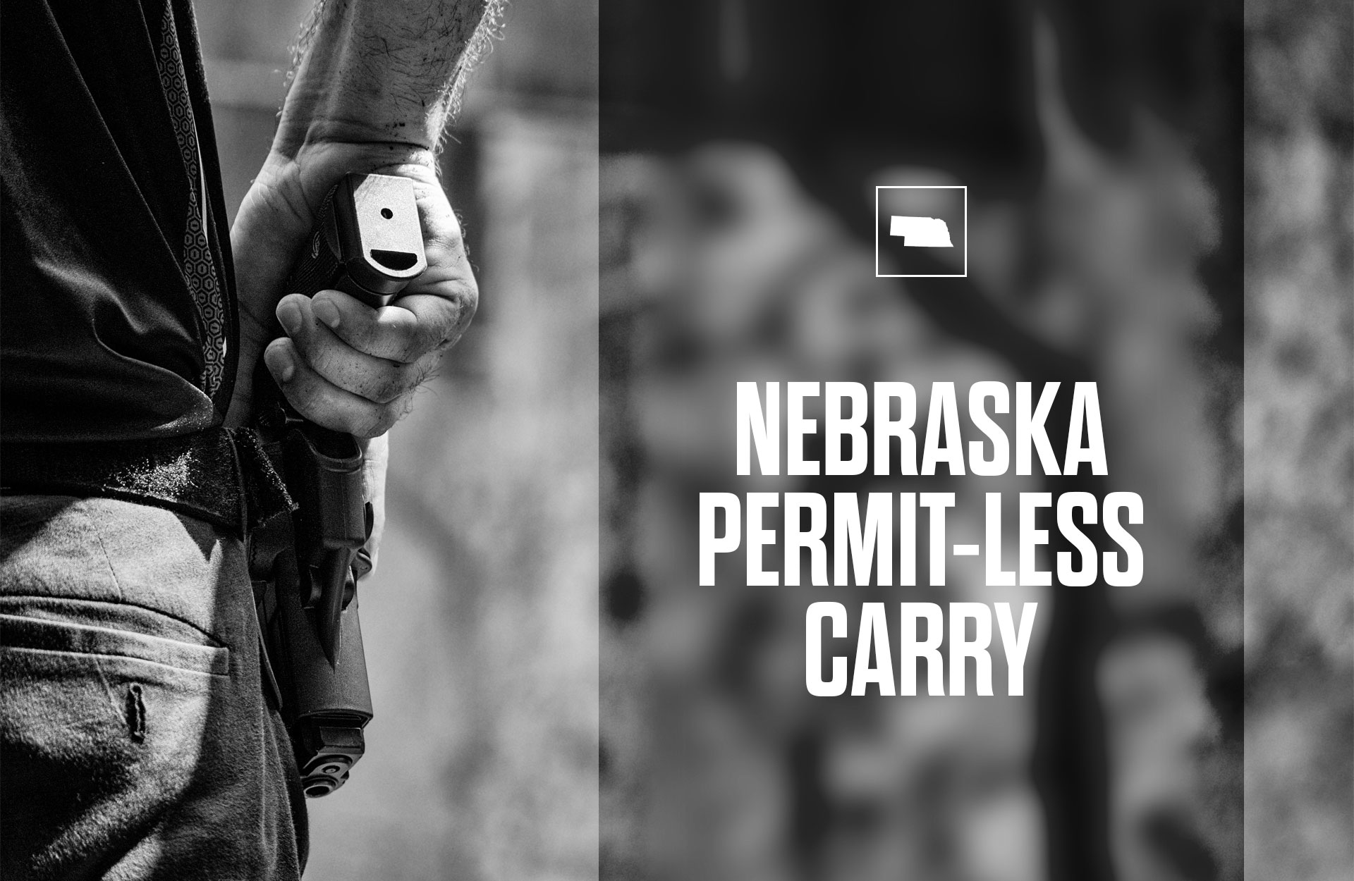 black and white photo of man holding handgun in holster