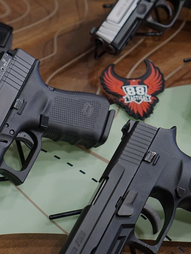 two firearms sitting on a table with the 88 Tactical logo